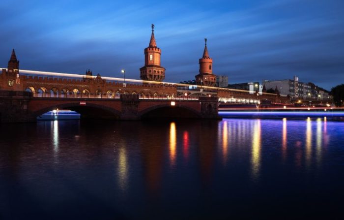 The Oberbaumbruecke lit up, at night.