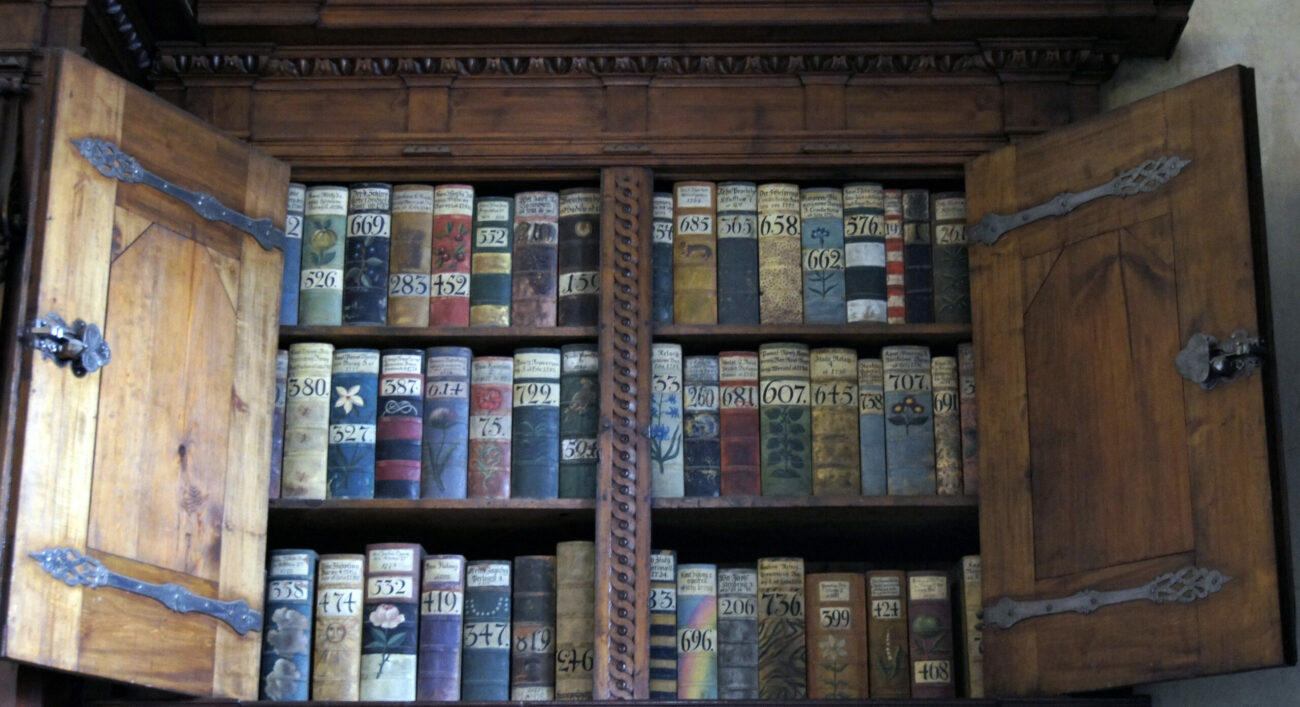 A cabinet of old books in prague castle