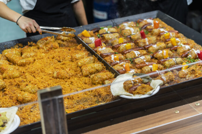 Potato pancakes and stuffed cabbage being sold at a Christmas market in Budapest