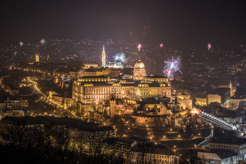 Buda Castle or Royal Palace in Budapest, Hungary with Fireworks at midnight on New Year's Eve