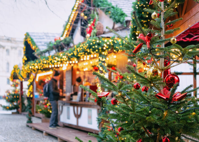 Christmas Market at Opernpalais at Mitte in Winter Berlin, Germany. Advent Fair Decoration and Stalls with Crafts Items on the Bazaar.