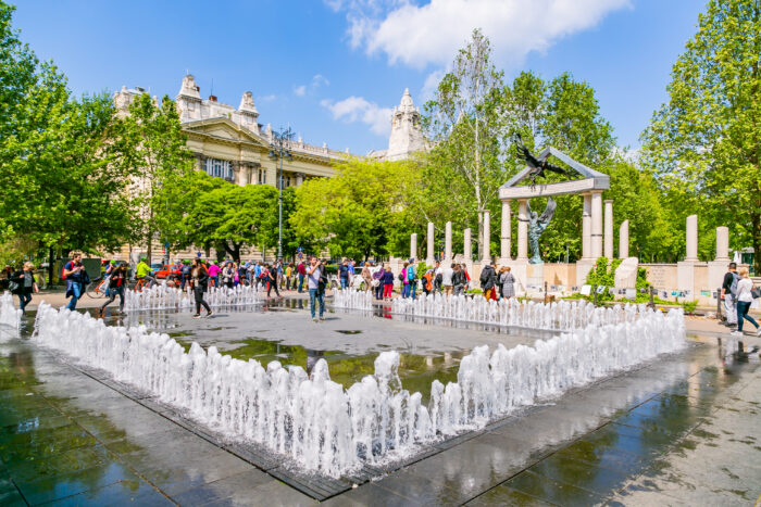 Dancing fountains in Liberty Square, Budapest, Hungary, on a warm sunny spring day